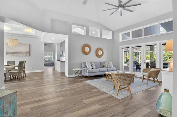 Another view of the formal living room with a peek of the dining room on your left.