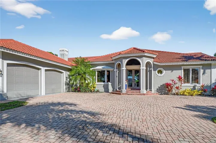 To the left is the two-car garage, however it is oversized so there is additional room for storing your toys