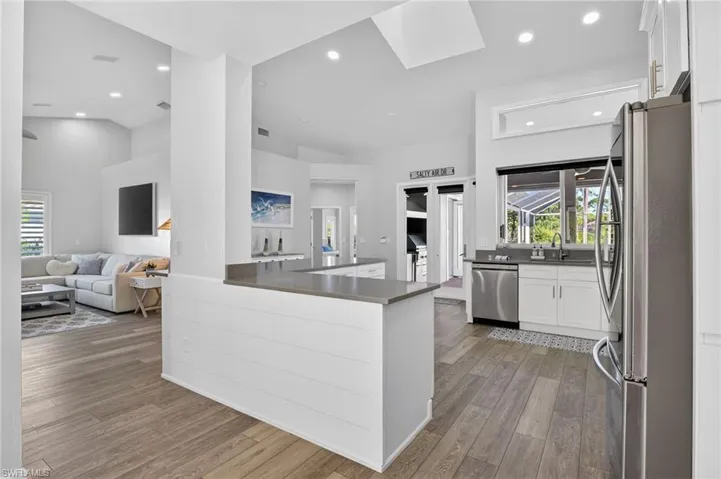 Your first view of the impressive, large and fun kitchen in this very social home