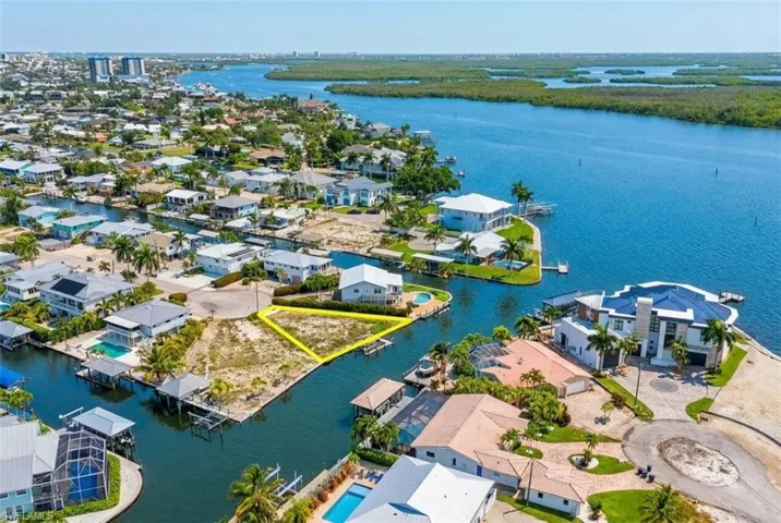Vacant waterfront lot with direct canal access - Virtually Edited Image