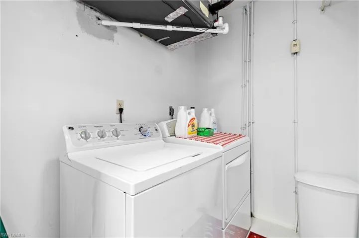 Washroom with separate washer and dryer