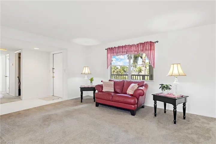 Living area featuring carpet floors