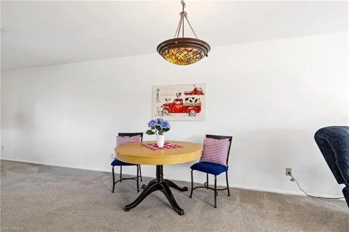 Dining room featuring carpet