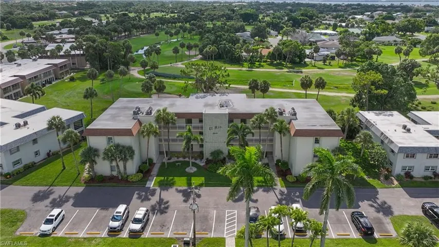 Aerial perspective of suburban area with a golf course