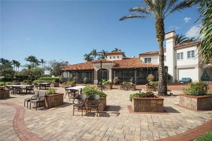 View of patio / terrace featuring a sunroom