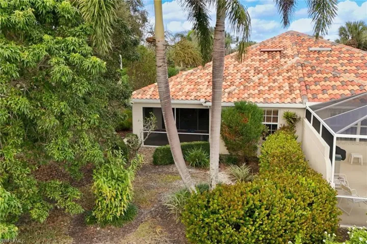 View of home's exterior featuring a lanai