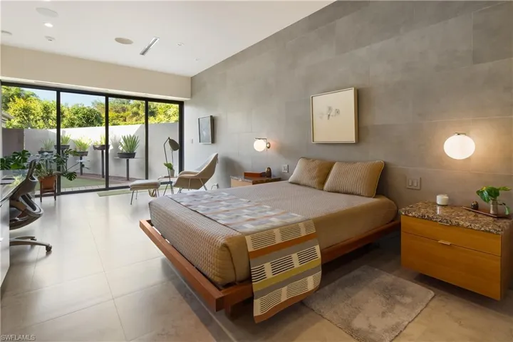Suite with globe style sconces and secret walled garden access.