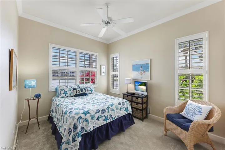 Light and bright 2nd BR with panoramic views of lake.  Another dream realized by your guests! With Crown molding, Plantation shutters, ceiling fan, and closet. Fully furnished!