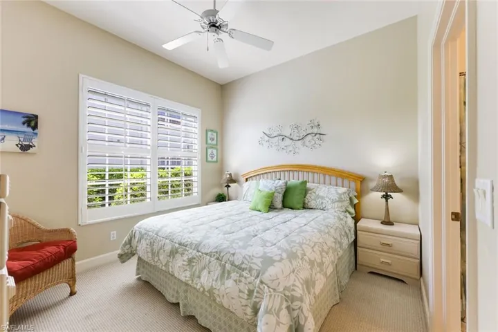Guest Bedroom is en-suite and privately distanced from common areas and Master BR. Guests can catch a view of lake from bed. Plantation Shutters and ceiling fan for maximum comfort.