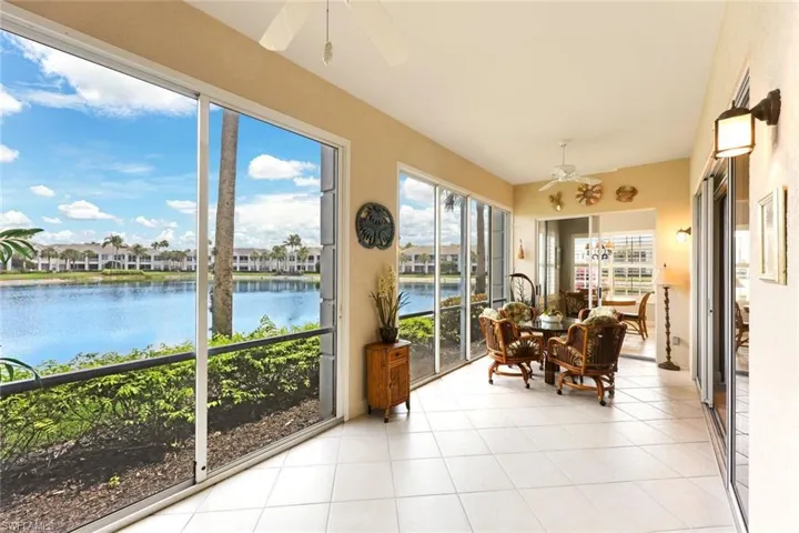 Spacious tiled and glassed Lanai  for year round enjoyment with serene views to blue lake and Breakfast nook.