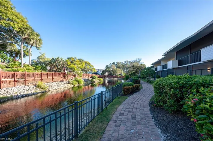 View of home's community featuring a water view