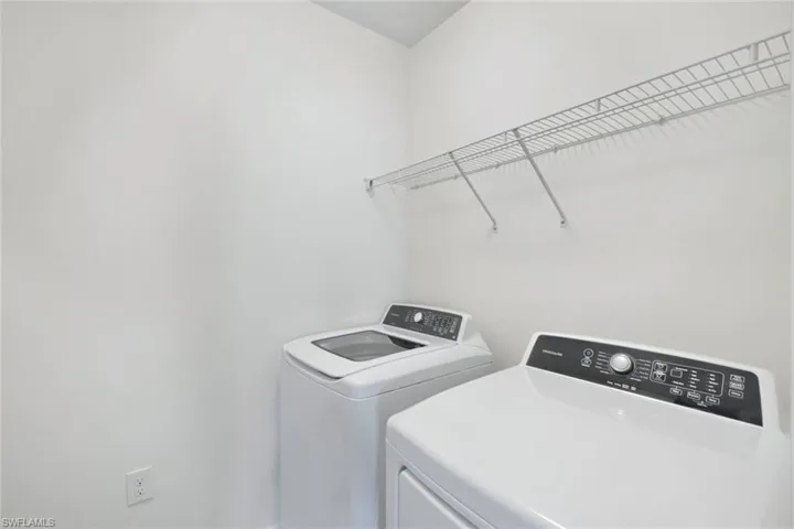 Laundry room with separate washer and dryer