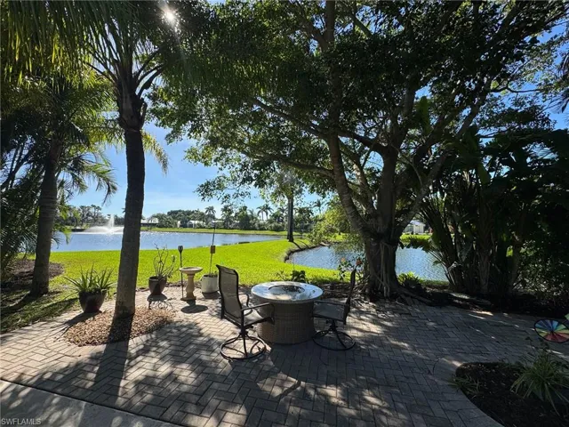 View of patio / terrace with a water view