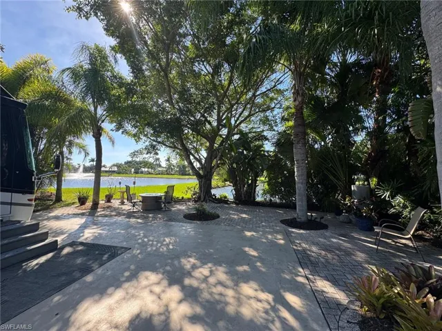 View of patio / terrace featuring a water view