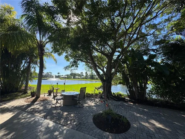 View of patio / terrace with a water view
