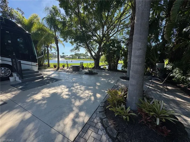 View of patio / terrace featuring a water view