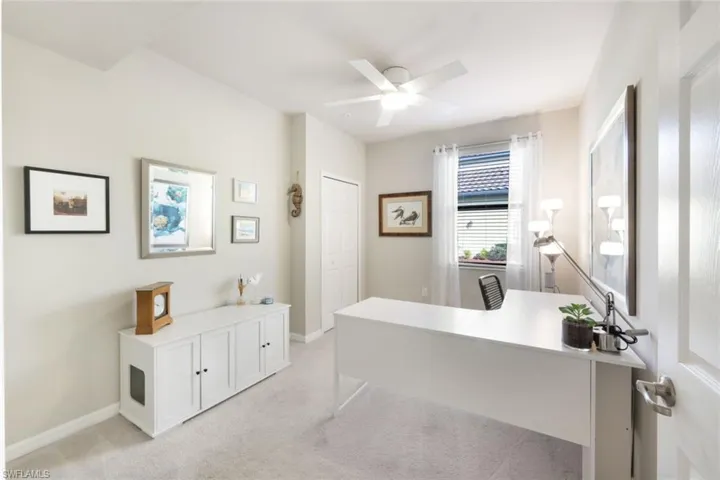 Second spare bedroom with ceiling fan.