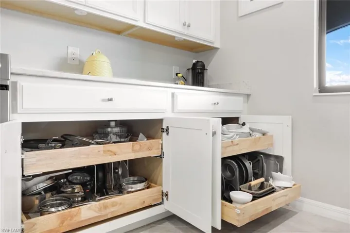 Lower kitchen cabinets with pull out shelving.