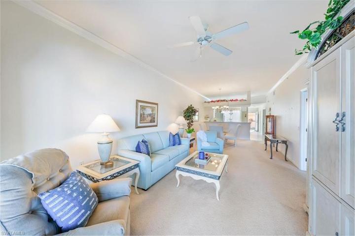 Tastefully decorated living room and dining room.