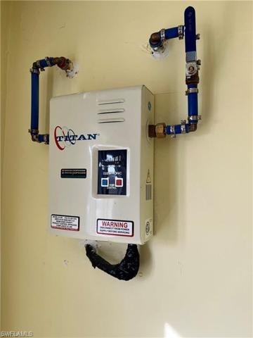 Instant Water Heater located in Laundry Room