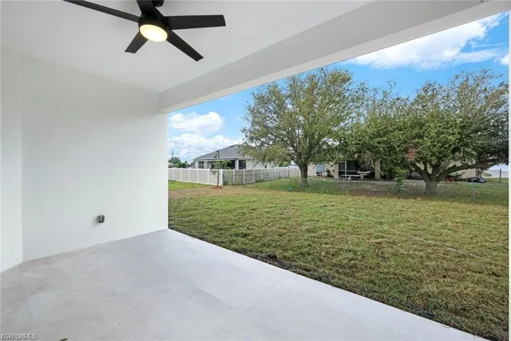 View of patio / terrace featuring ceiling fan.