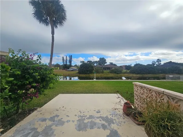 View of patio with a water view
