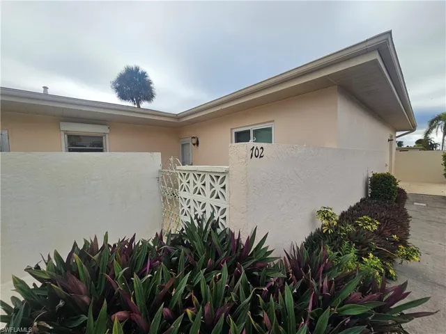 View of home's exterior with stucco siding