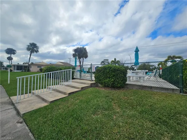 View of yard with a gate