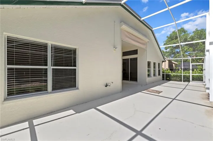 View of patio / terrace featuring a sunroom and a lanai