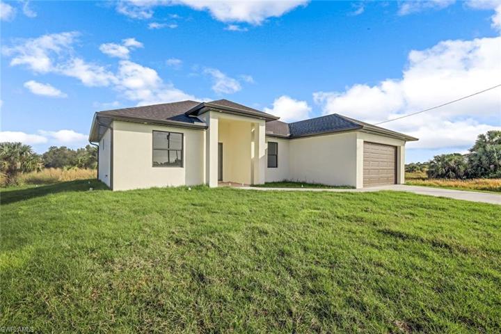 821  Milwaukee  BLVD, LEHIGH ACRES, FL 33974