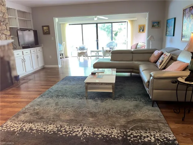 Living room featuring dark hardwood / wood-style floors