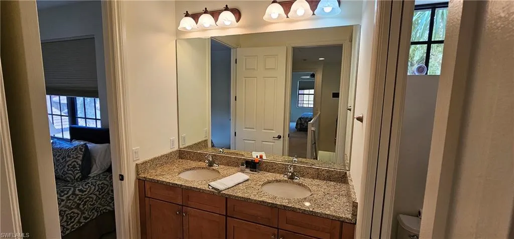 Bathroom featuring shower / bath combination with curtain, tile patterned floors, and a textured ceiling