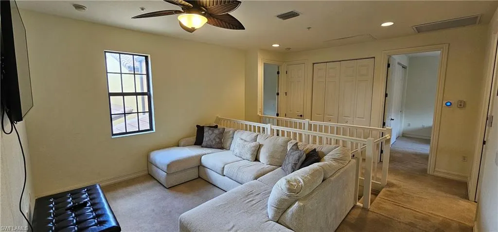 Half bath with toilet and tile patterned floors
