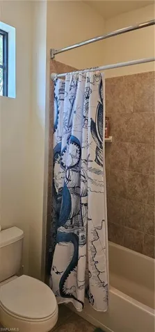 Bathroom with vanity and tile patterned flooring