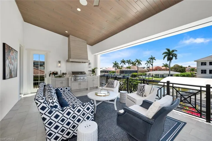 Outdoor seating area with outdoor kitchen
