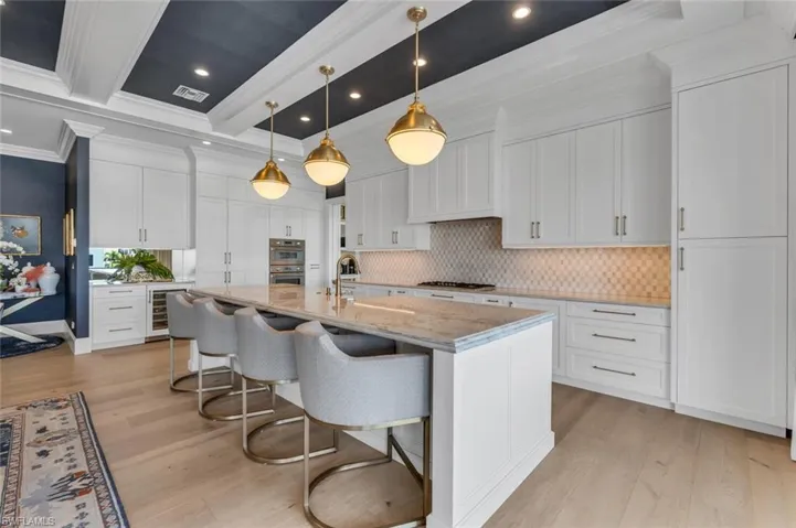 Large Island that opens to upper level patio
