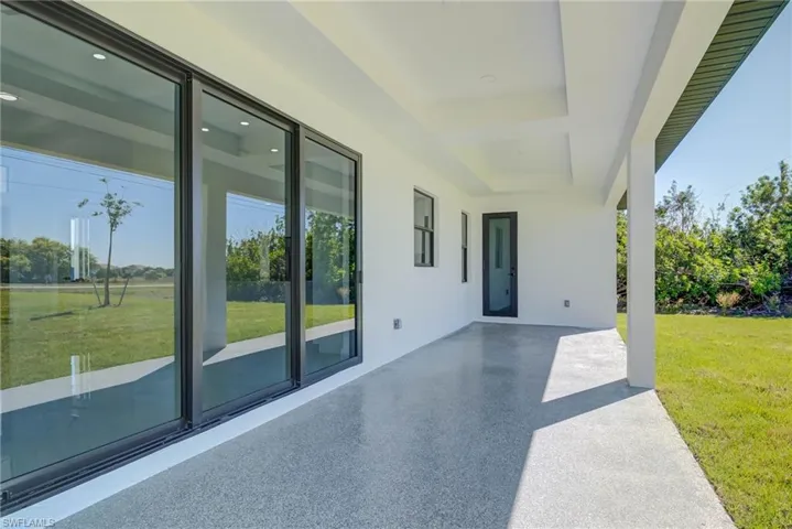 View of patio with an attached carport