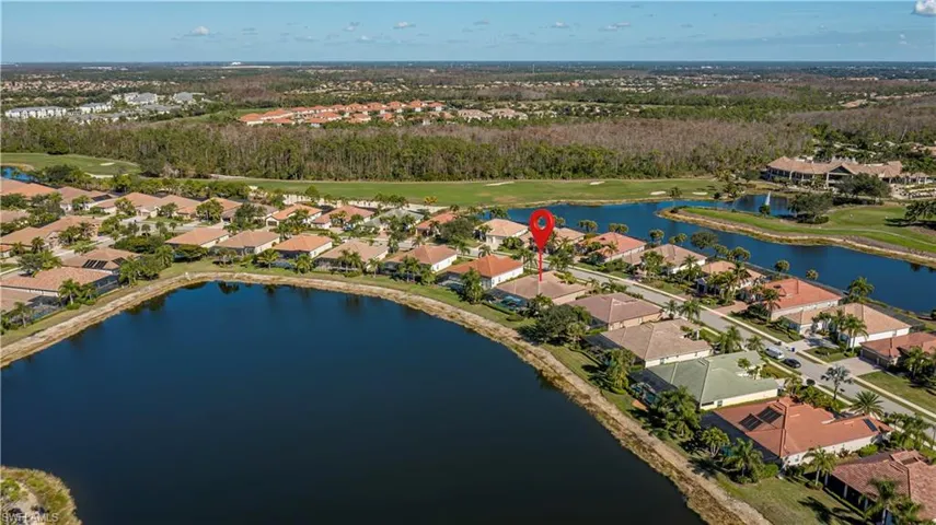 drone photo of home and neighborhood