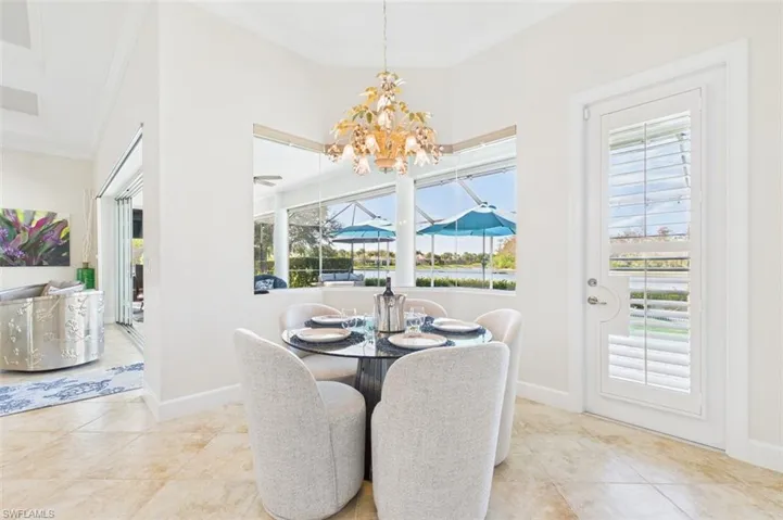 Eat in kitchen area looking out towards lanai and great room