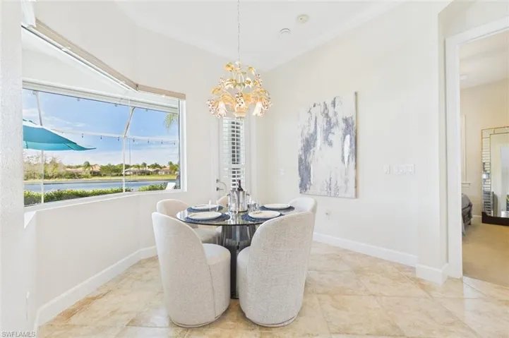 eat in kitchen looking towards the guest bedroom #3 and beautiful wide water view and preserve