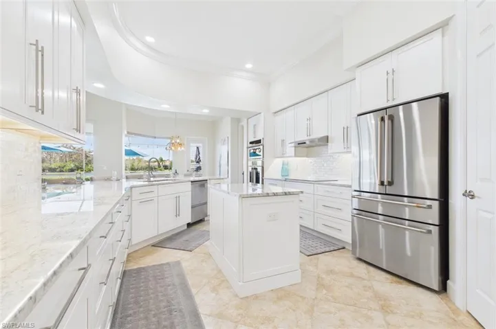 beautiful newly remodeled kitchen with high end stainless steel appliances