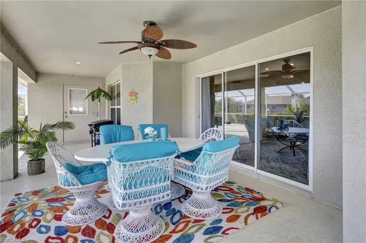 Sunroom with a ceiling fan