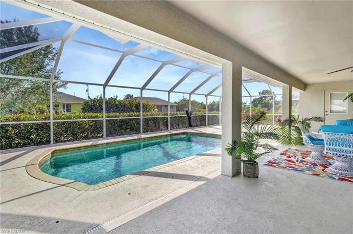Pool with a patio and a lanai