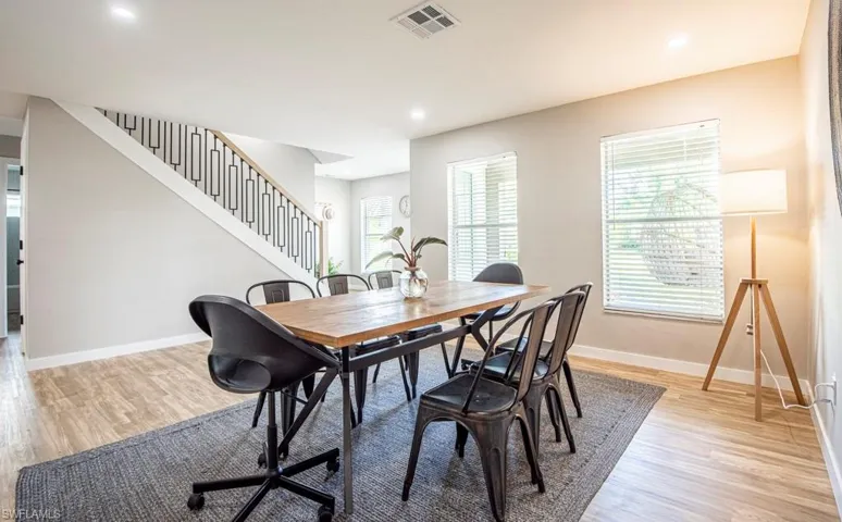 Dining space with light wood-type flooring