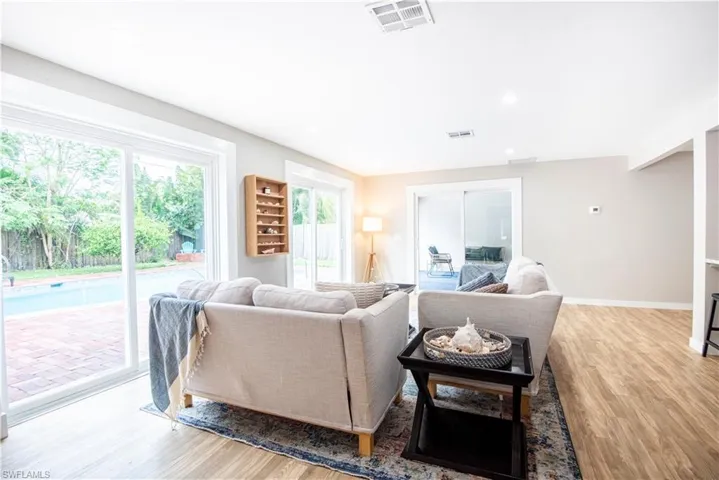 living room open to the pool