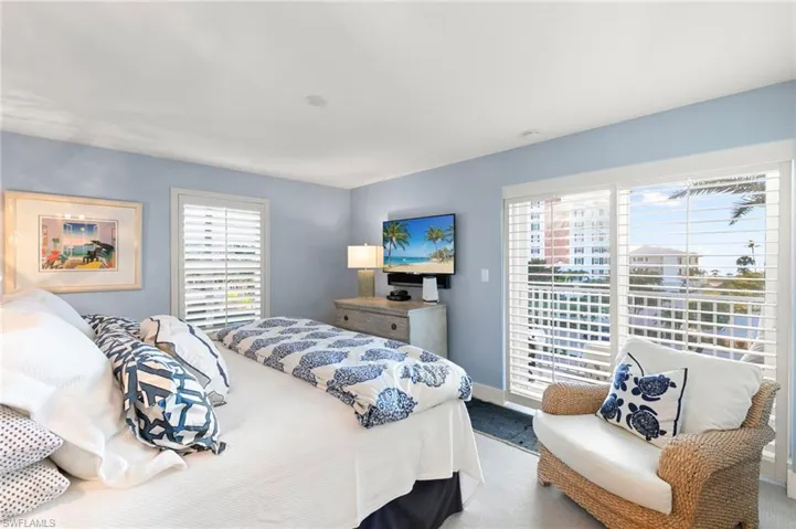 Master bedroom with views of the Gulf and walk out patio