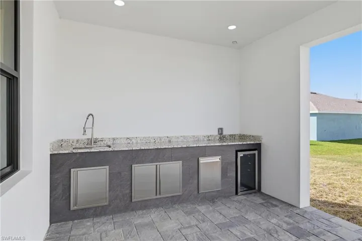 View of patio / terrace with exterior kitchen and beverage cooler