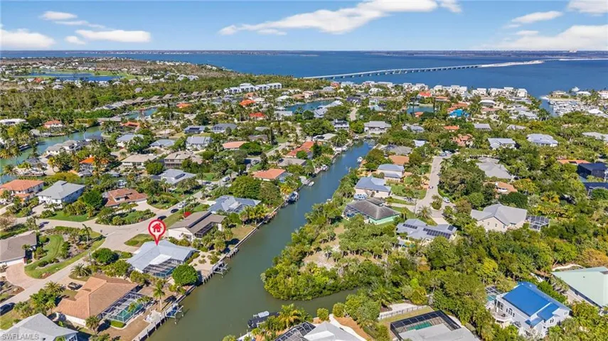 View of property location featuring nearby suburban area and a large body of water
