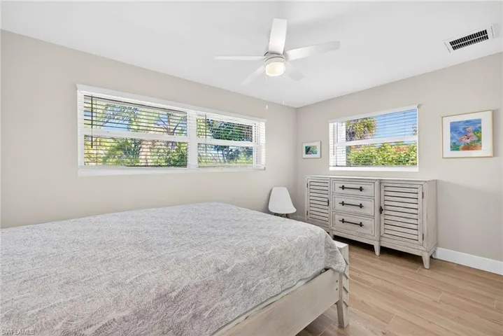 Bedroom featuring light wood-style flooring and ceiling fan