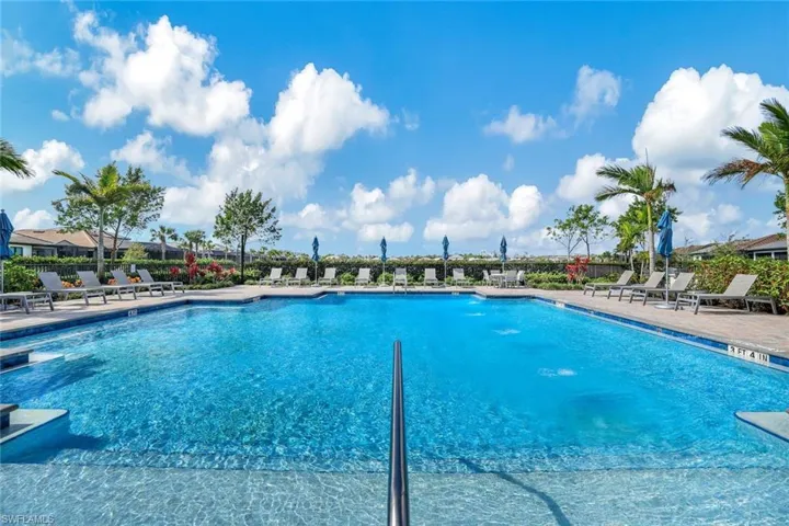 View of swimming pool with a patio